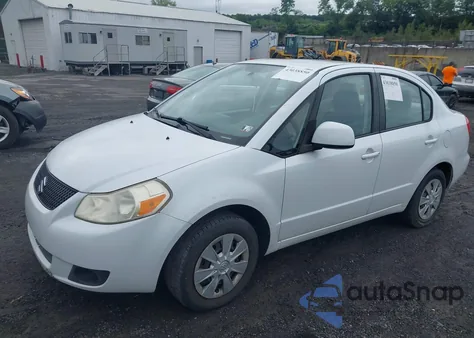 2011 Suzuki Sx4 Le/Le Anniversary Edition из США, поврежденный, VIN JS2YC5A28B6300723